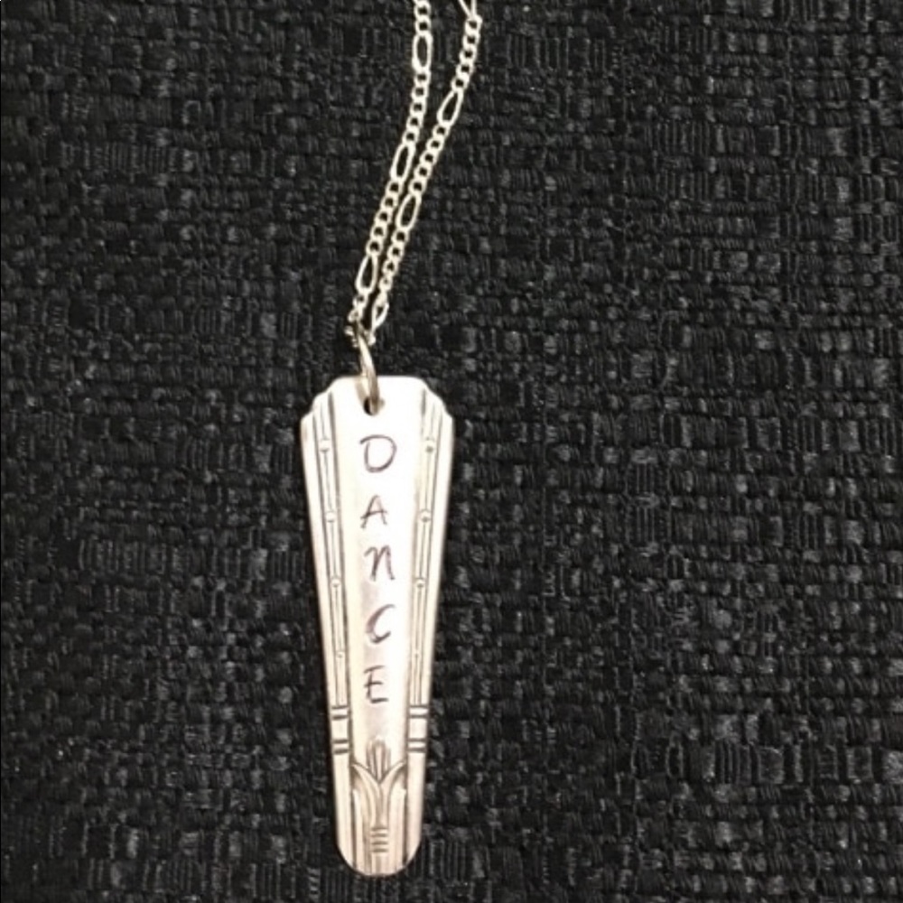Silver necklace with dance pendant
